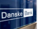 Scandal-plagued Danske Bank profits fall, sending shares plunging