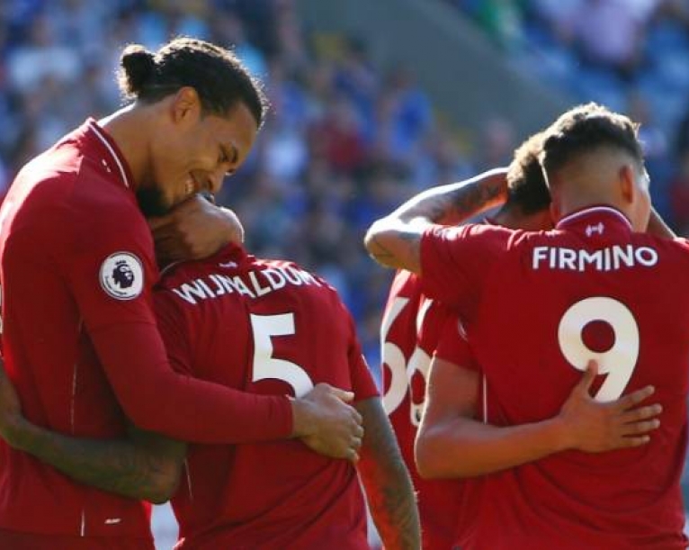 Liverpool's record-breakers eye home straight