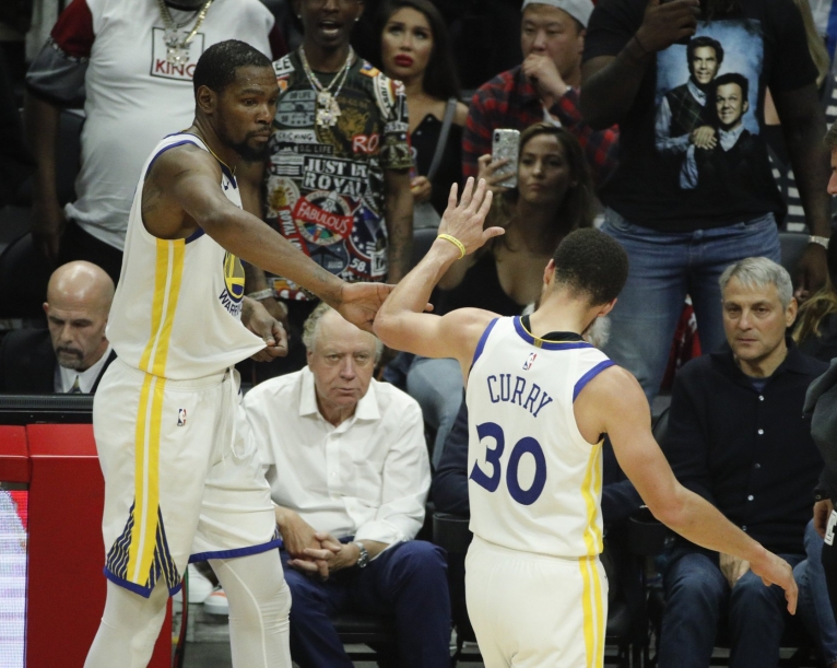 Durant has 50, Warriors beat Clippers 129-110; Rockets next